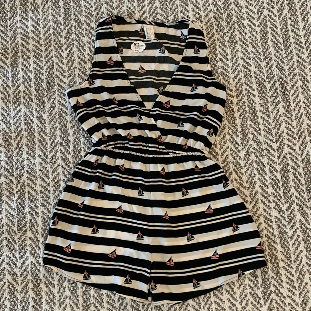 Striped nautical romper with pink sail boats